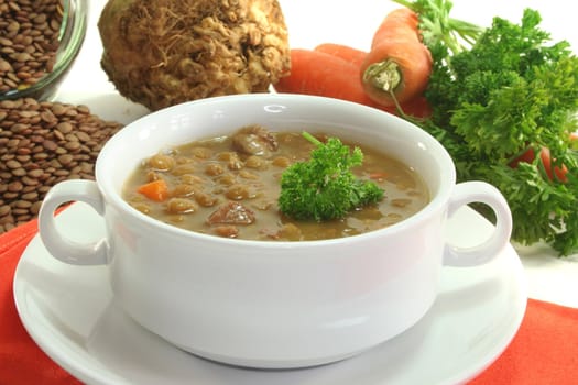 Lentil stew with potatoes, carrots and parsley