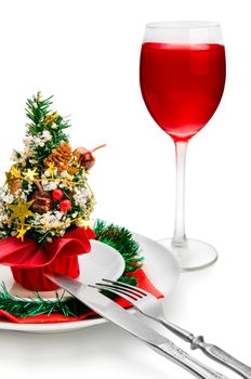 glass of red wine and Christmas decoration, isolated on white background