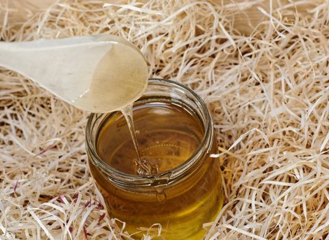 wood spoon and fresh honey