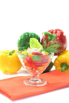 colorful bell pepper salad with dill in small glass bowls