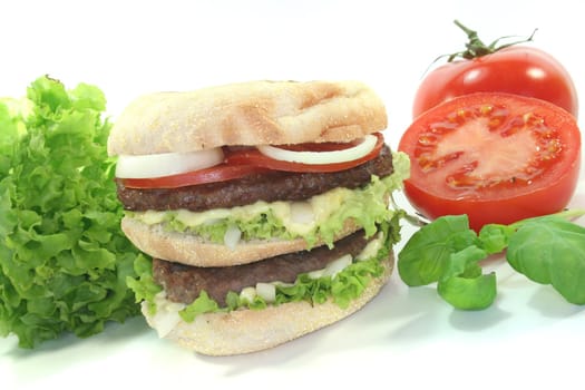 double hamburger with fresh vegetables on white background
