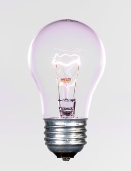 Glass incandescent tungsten filament light bulb due to be replaced due to energy concerns