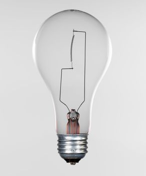 Glass incandescent tungsten filament light bulb due to be replaced due to energy concerns