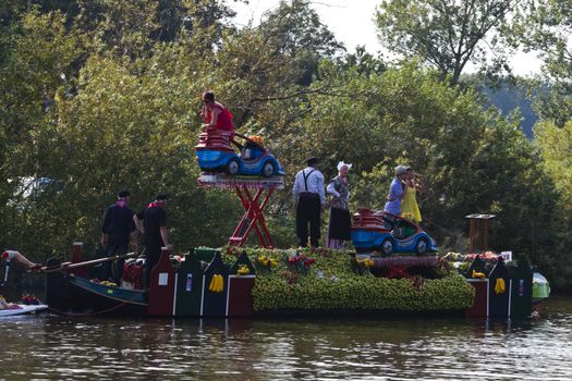 VLAARDINGEN - AUGUST 05: Each year this unique floating parade of beautiful decorated boats sail through the Westland. Theme this year: Theatre on water, August 05, 2011, Vlaardingen, the Netherlands

