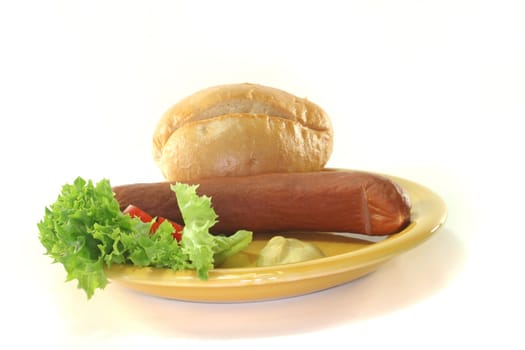 Frankfurter sausages with bread and salad on a white background