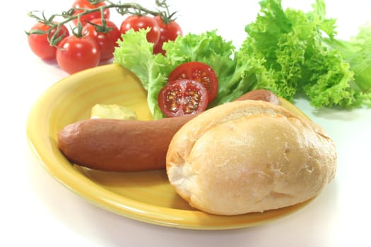 Frankfurter sausages with bread and salad on a white background