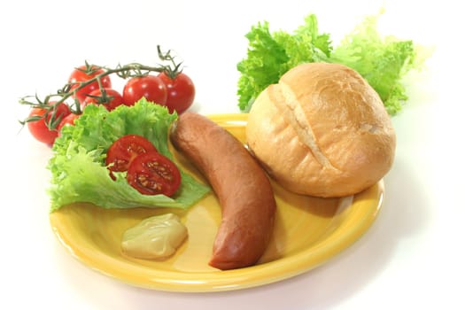 Frankfurter sausages with bread and salad on a white background