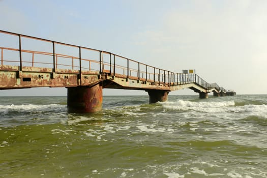 Old pier that extends into the sea