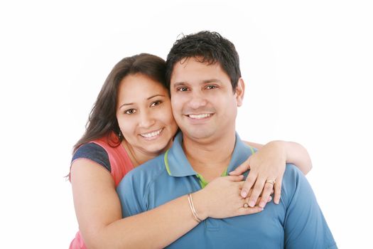 Portrait of a beautiful young happy smiling couple - isolated