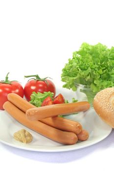 Wiener Sausage with Sesame bun and lettuce on a white background