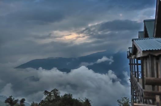 Sea of clouds,blue mountain,cottage, bush,storm clouds,