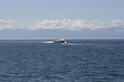 big and small boat in sea water