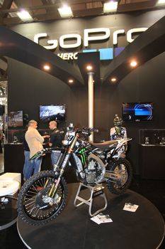 Looking at new motorcycles during EICMA 2011, International Motorcycle Exhibition.