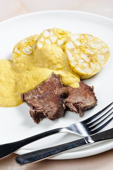 sirloin on cream with dumplings