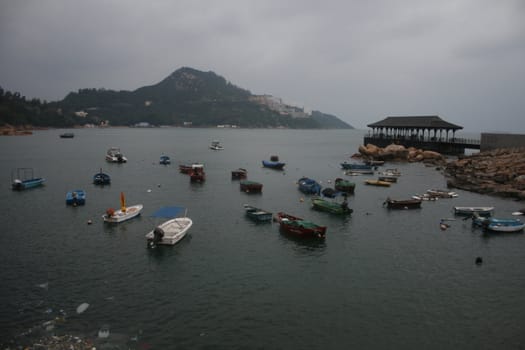 small boats in the harbor of Hong Kong