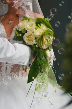 Bride with bouquet and grasses