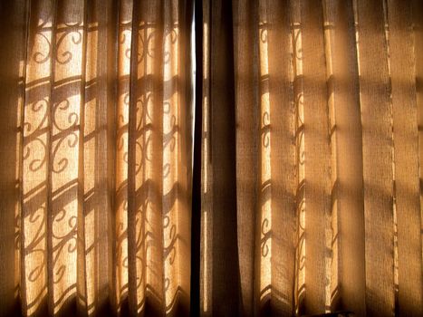 Curtain with shade of iron-window-protection.