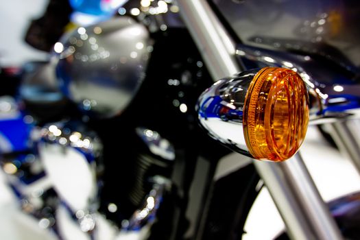 Close-up image of turn signal of motorcycle