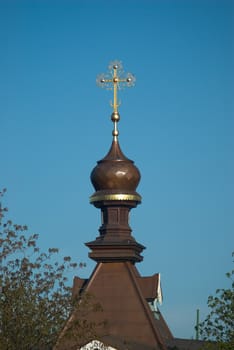Dome of orthodox church on a blue sky background.