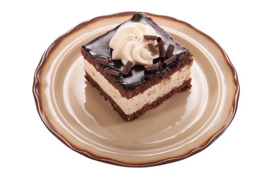 piece of chocolate cream cake, isolated on white