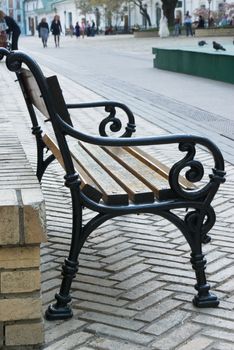 Old-fashioned bench in city park