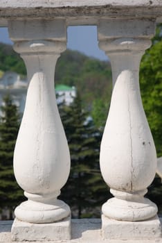 Closeup of stone balustrade in white