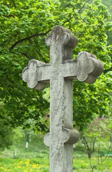 
christian stone cross on the unknown tomb