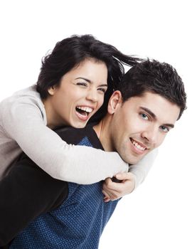 Attractive and happy young couple isolated over a white background