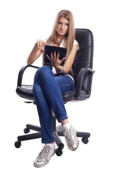 Beautiful Woman Using Tablet Computer siting in office chair
