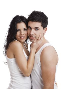 Beautiful and attractive young couple standing over a white background