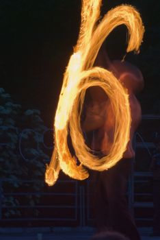 
fire-show, man in action with fire