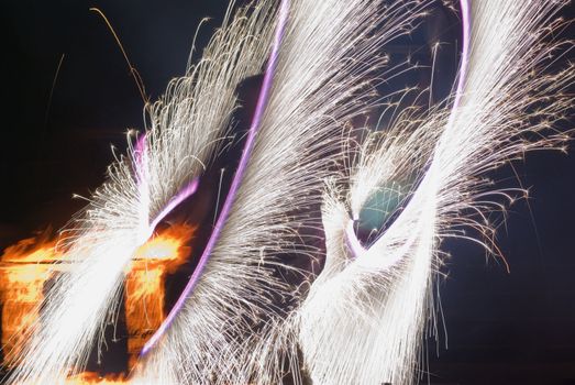  Many golden fireworks bursts at fireworks festival