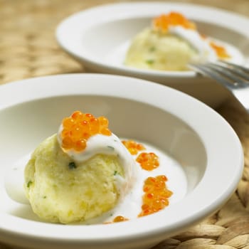 cold potato dumplings with cream and caviar