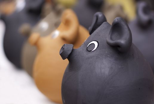 Clay Piggy banks or money-boxes being for sale.