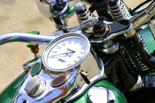 Top view of a classic green motorcycle