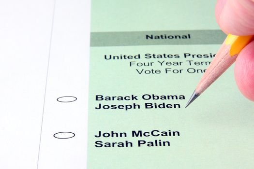 Person filling out ballot for US presidential election