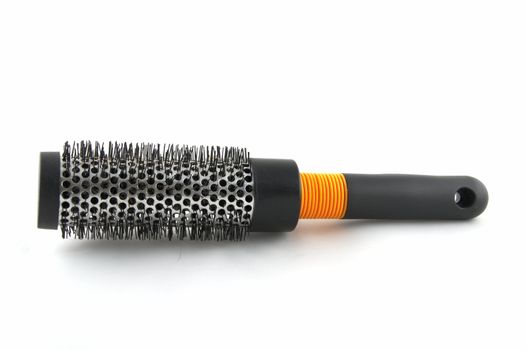 A rigid hairbrush for long hair