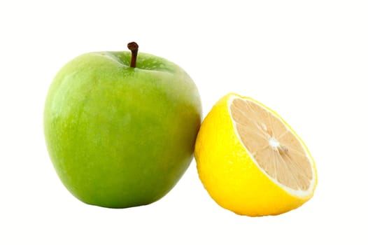 Green apple and acid-yellow lemon on isolated background.