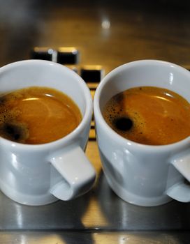 two ready coffes seved in typical porcelain small cup, Milan,Italy