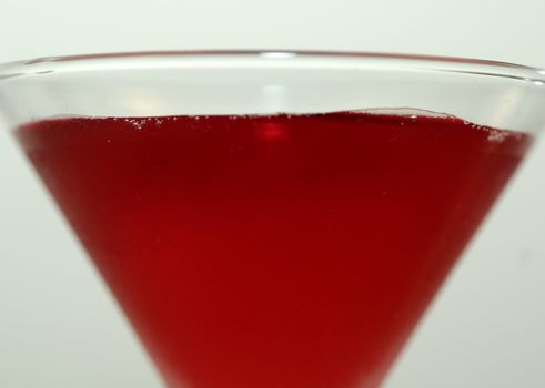 macro shot of red martini cocktail on classic glass