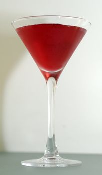 macro shot of red martini cocktail on classic glass