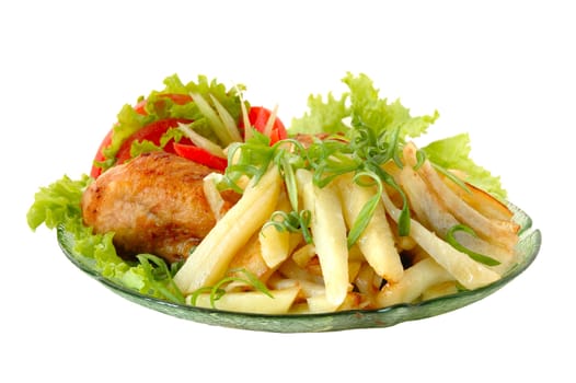 Fried chicken and potato with vegetables (tomato and lettuce).