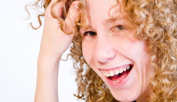 A girl who is having fun  in the photo studio