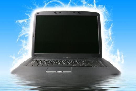 Black laptop in water on a dark blue background