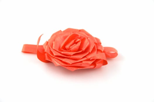 Ornament of gifts in the form of a rose on a white background