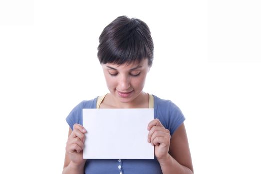 Young girl holding a card, close up