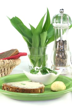 a slice of bread with wild garlic curd