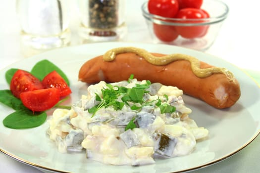 Sausage and potato salad with fresh herbs