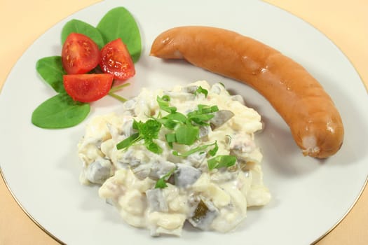 Sausage and potato salad with fresh herbs