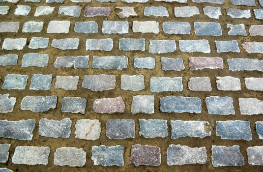 street background made of grey granite stones